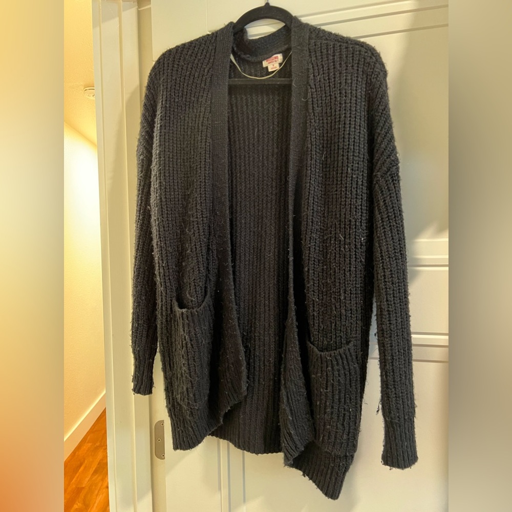 Black oversized cardigan with front pockets